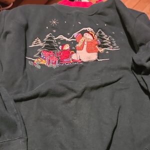 Festive Black Sweatshirt with Snowman and Sleigh Design